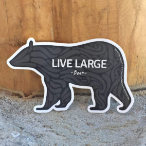 Black bear shaped sticker with Live Large on it.